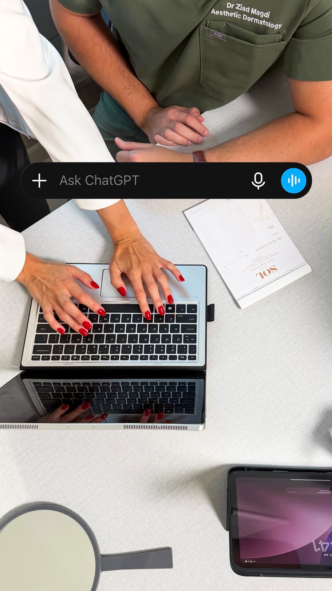 SÓL doctors reviewing a patient consultation form